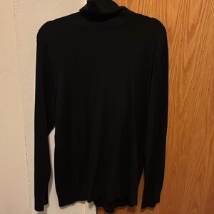 Black turtleneck from H&M. The size is an XL